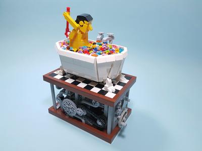 A man made of Lego sits in a bathtub made of Lego bricks