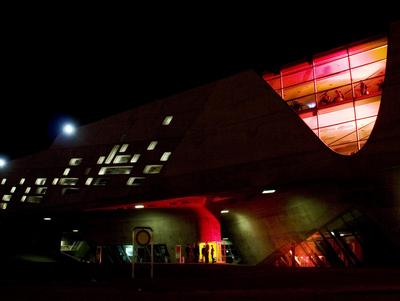 phaeno from the outside with red illuminated windows