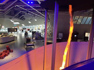 A tornado of fire in the middle of the exhibition area at phaeno